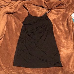 This is a black dress, its short with thin straps.